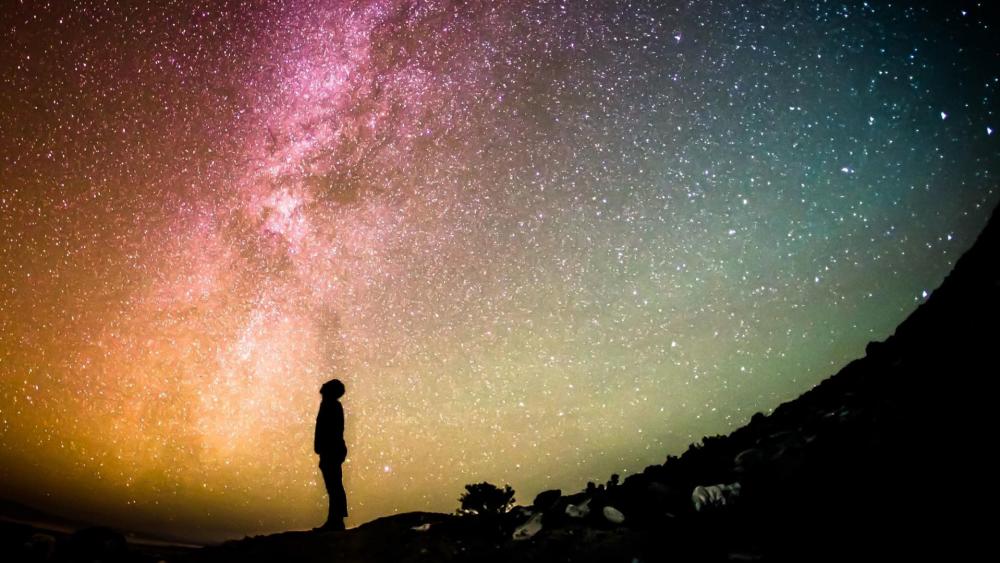 manlookingupthestarrynightsky